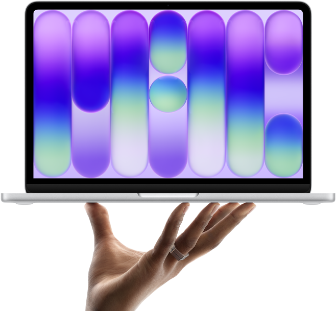 Ein MacBook Neo in der Farbe Silber wird auf den Fingerspitzen einer geöffneten Hand balanciert, das Display zeigt ein farbiges, abstraktes Muster